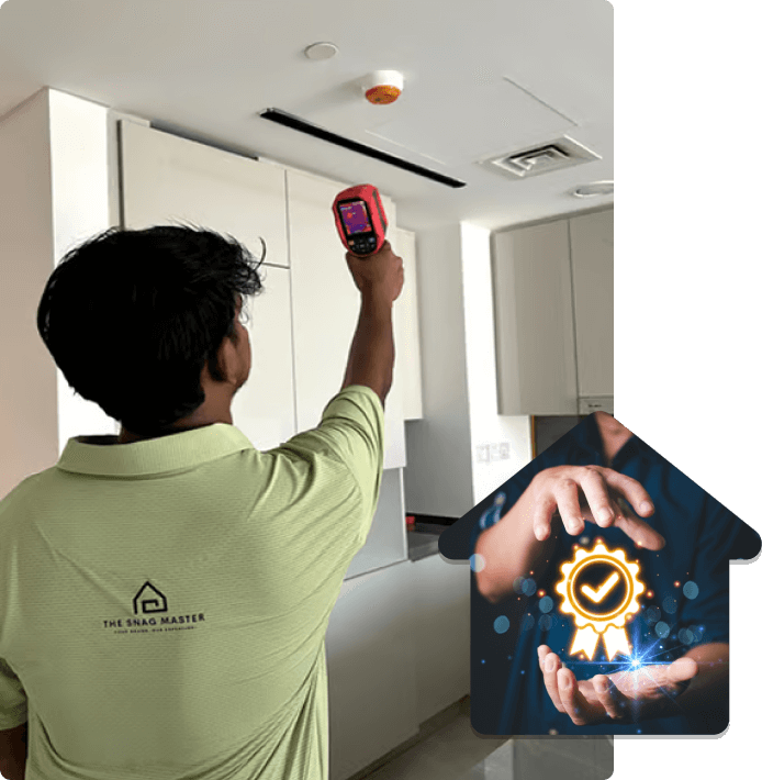 An engineer is using thermal camera to inspect leak in an apartment