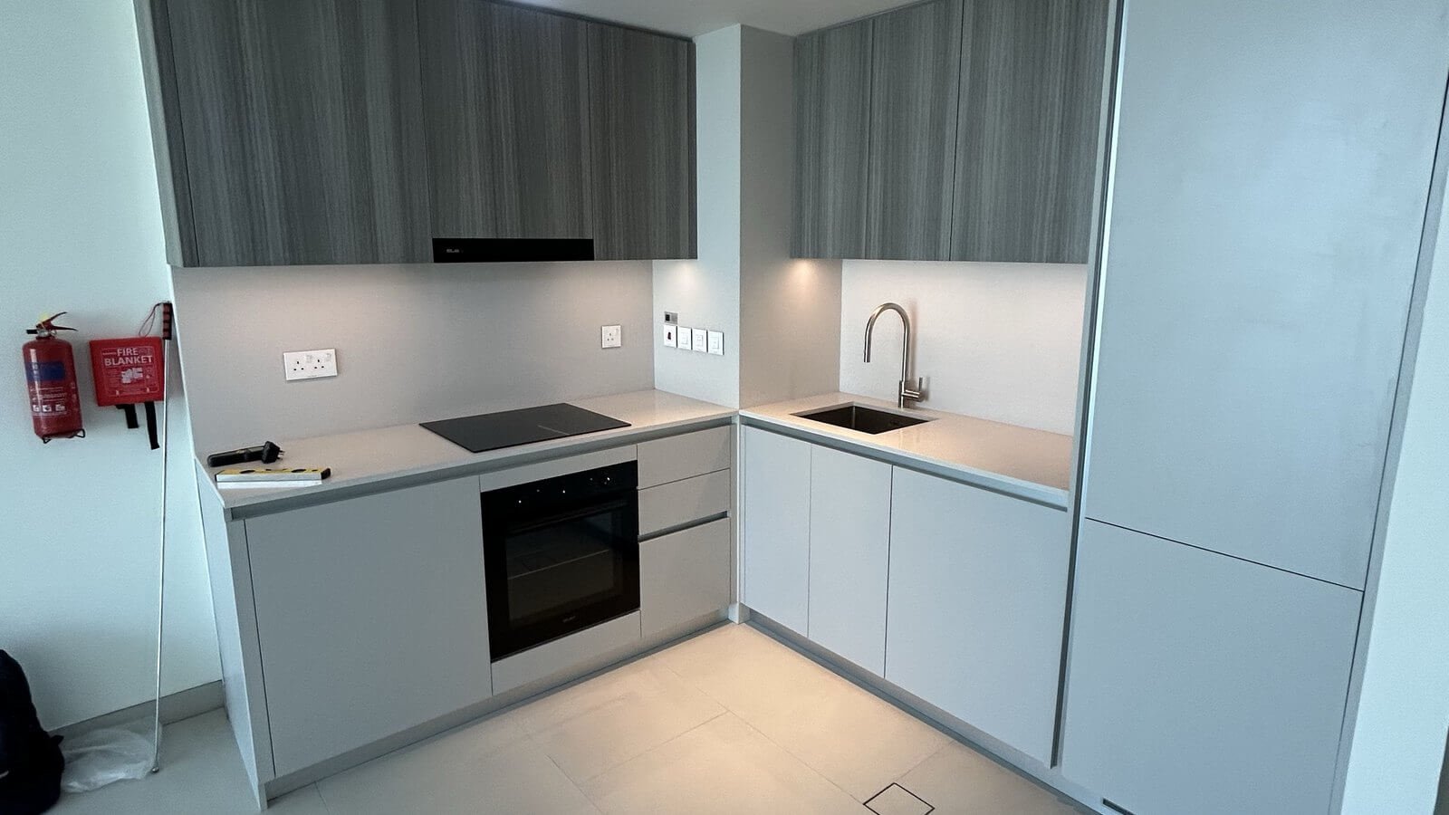 Kitchen inspection during a pre-handover snagging survey in Dubai